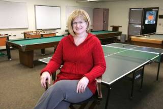 Debra LeRoy sits in the game room at the Kent Parks Community Center Jan. 28.
