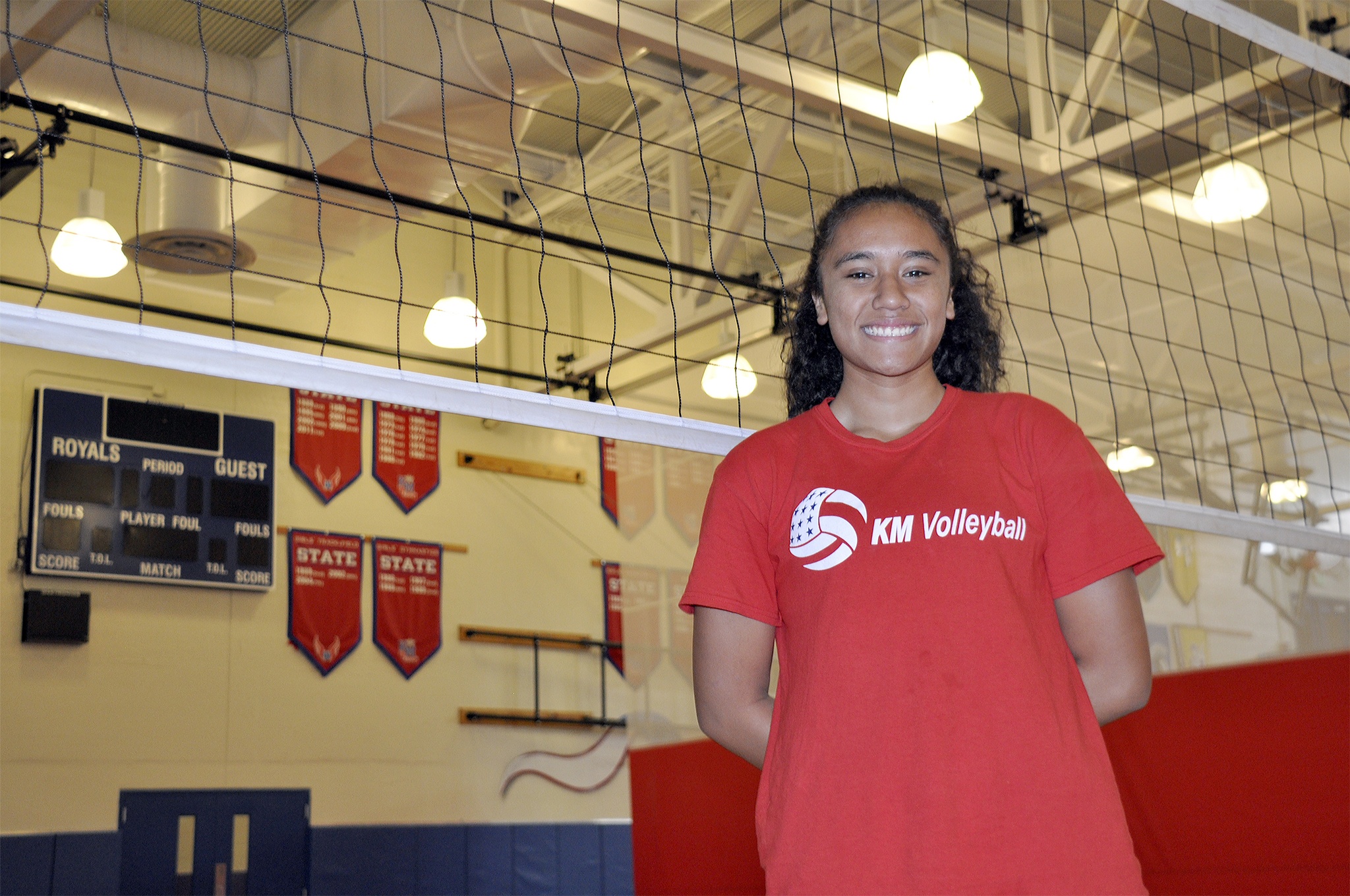 Eugena Faamausili follows her sisters footsteps playing volleyball at Kent-Meridian High School. Heidi Sanders