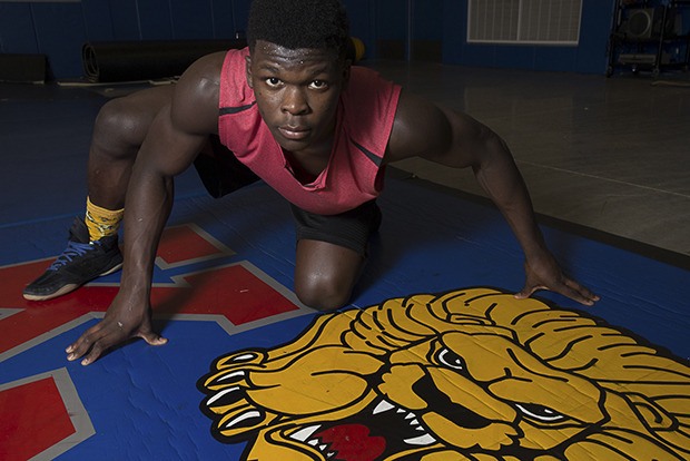 Kent-Meridian’s Emmanuel Daigbe takes an undefeated record in the regional tournament this weekend. He placed second at state last year and will chase a state title this year at the Mat Classic.