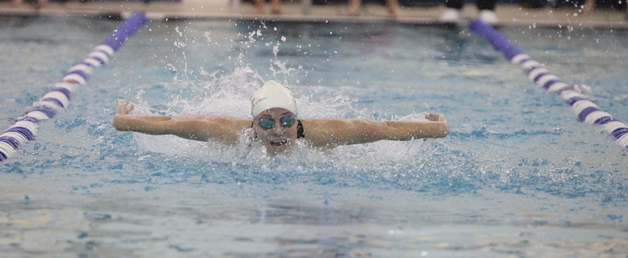 Kentridge High School senior Haley Childress swims her way to a second consecutive 4A West Central District title in the 100-yard butterfly. Childress’ victory in the event helped lead her team to a second-place finish in the meet last Saturday. COURTESY PHOTO, TRACY ARNOLD