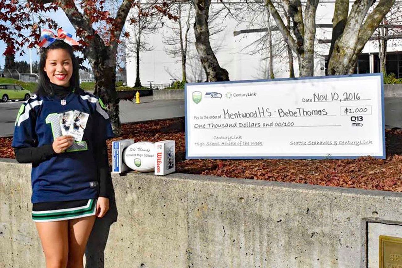 Kentwood senior Alexia Thomas was named CenturyLink High School Athlete of the Week. On Nov. 10 she was presented with two game tickets, a jersey, Seahawks football and a $1,000 check for Kentwood’s Athletic Department. Contributed photo