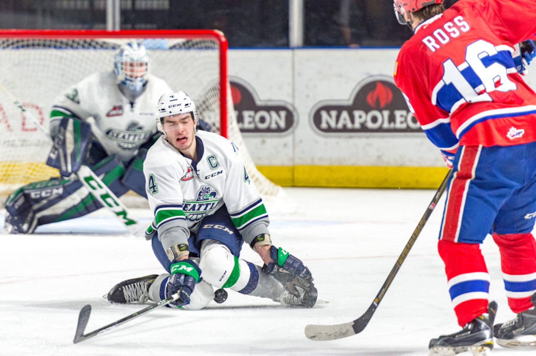 The Thunderbirds’ Turner Ottenbreit prepares to block a shot with Rylan Toth back in goal. COURTESY PHOTO, Brian Liesse/T-Birds