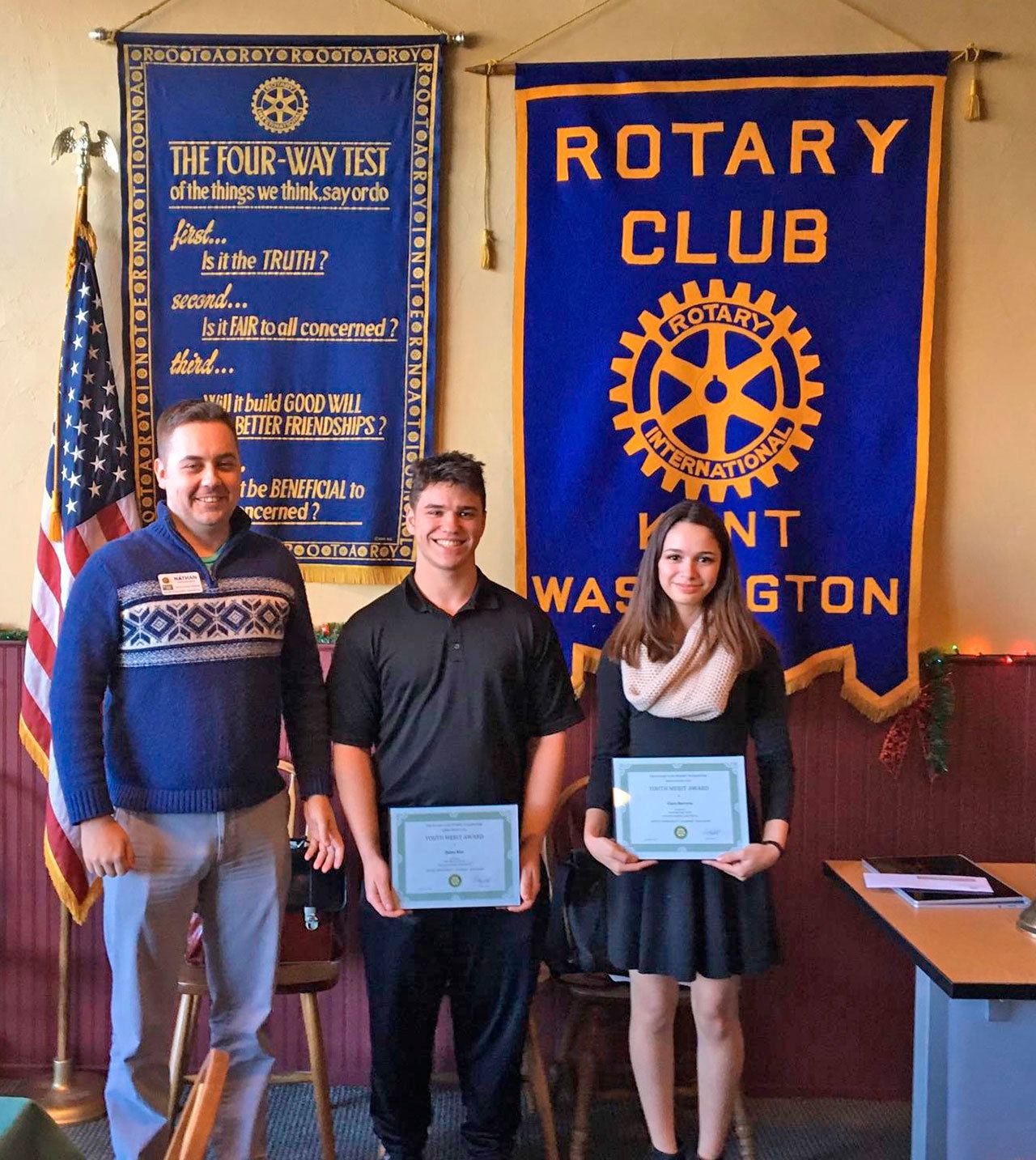 Kentridge’s honored students Quinn Kiel and Clara Herrera, with Kent Rotary President-elect Nathan Box of Kent Youth and Family Services. COURTESY PHOTO