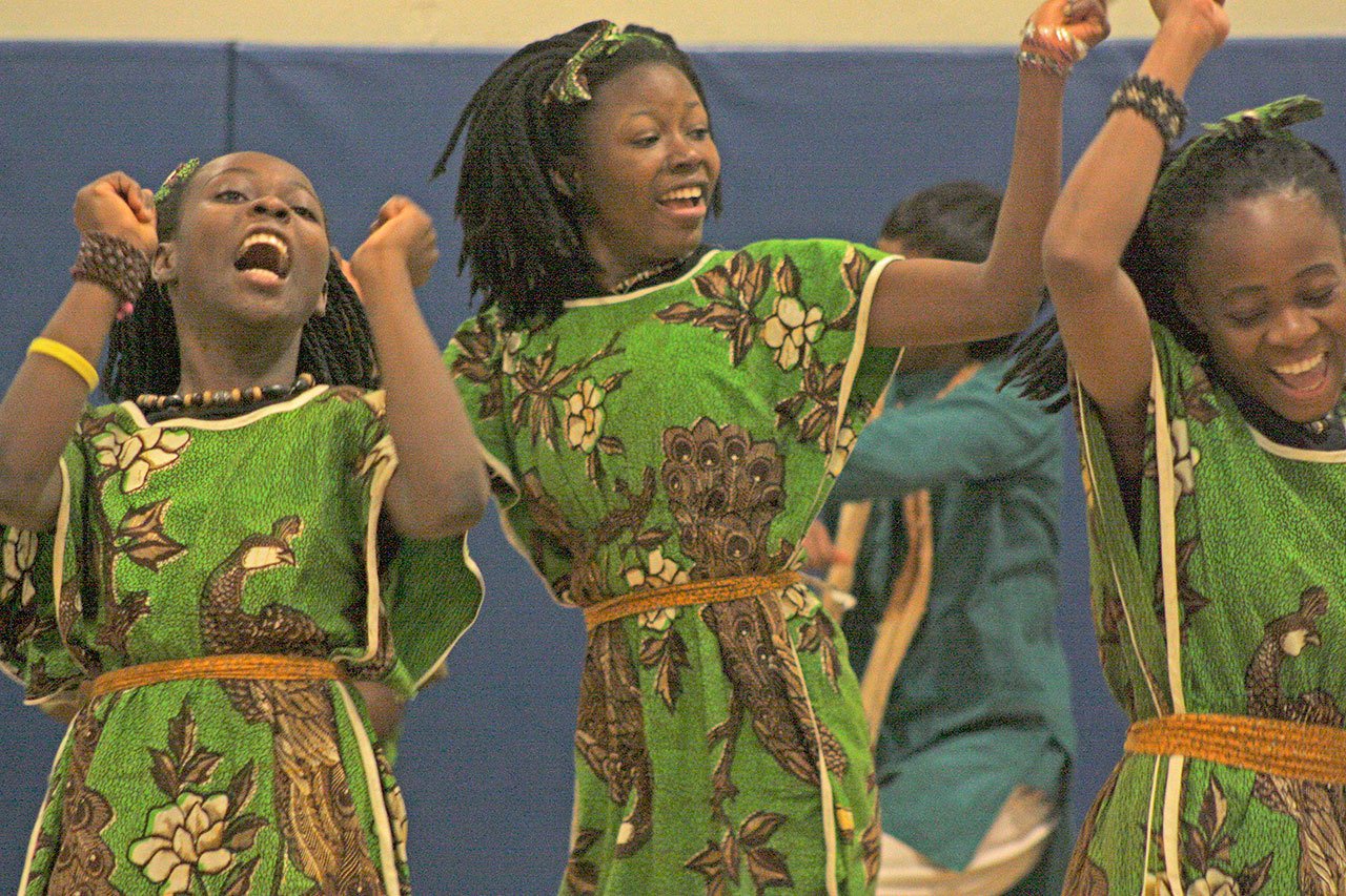 The Matsiko Children’s Choir pumped up the crowd at Mill Creek Middle School. MARK KLAAS, Kent Reporter