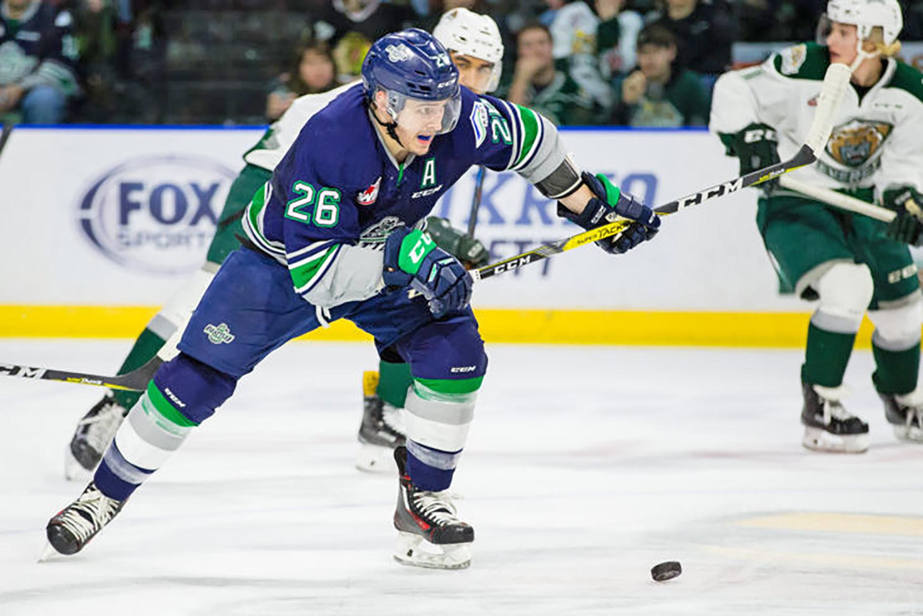 The Thunderbirds’ Nolan Volcan brings the puck up the ice against the Silvertips on Friday night. COURTESY PHOTO, Chris Mast