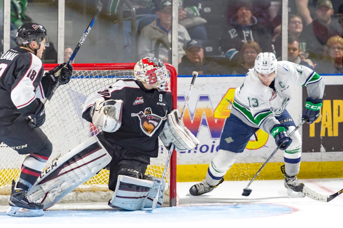 The Thunderbirds’ Mathew Barzal looks to fire a shot at Giants goalie David Tendeck during WHL play Saturday night at the ShoWare Center. COURTESY PHOTO, Brian Liesse/T-Birds