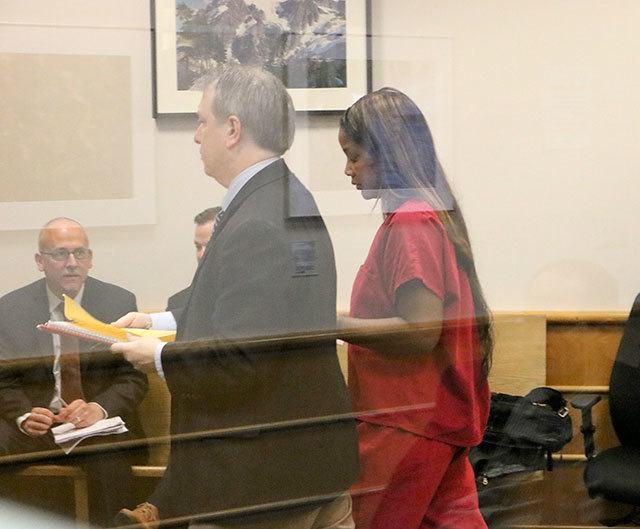 Ka’Deidre Rials, photographed through a glass partition on Wednesday at the King County Courthouse in Seattle, pleads not guilty to a felony hit-and-run charge. Photo: Joe Livarchik/Issaquah-Sammamish Reporter