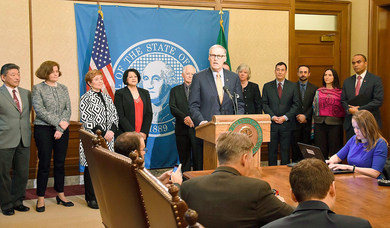 Gov. Jay Inslee with legislators during the media availability on Thursday in Olympia about an executive order signed by Inslee reaffirming Washington’s commitment to tolerance, diversity and inclusiveness. Courtesy Photo/Governor’s Office