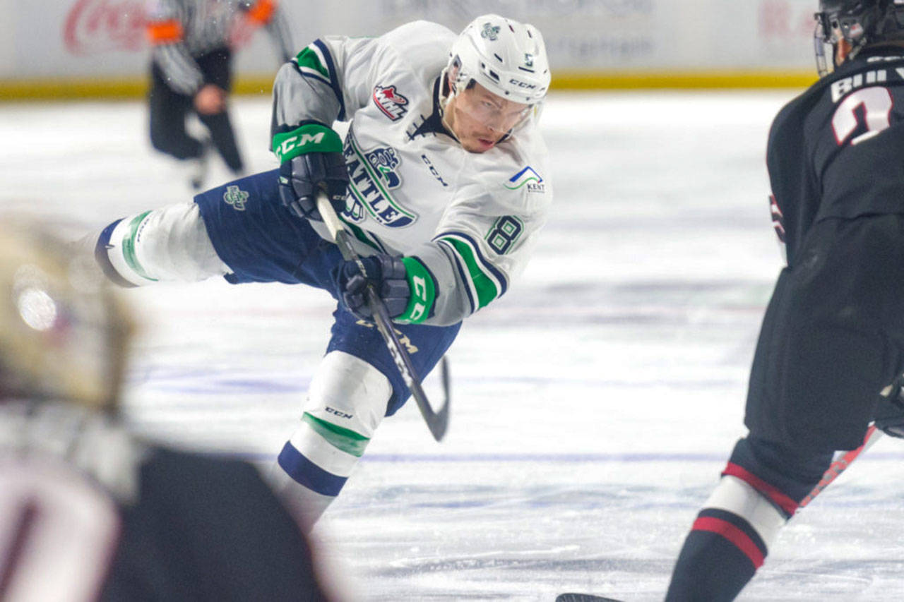 The Thunderbirds’ Scott Eansor fires a shot at the Giants during WHL play Sunday. COURTESY PHOTO, Brian Liesse/T-Birds
