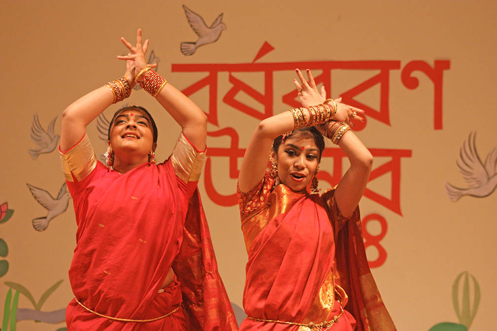Fahima Zaman, left, and Anusha Gani perform a classical Bengali dance during the festival. MARK KLAAS, Kent Reporter