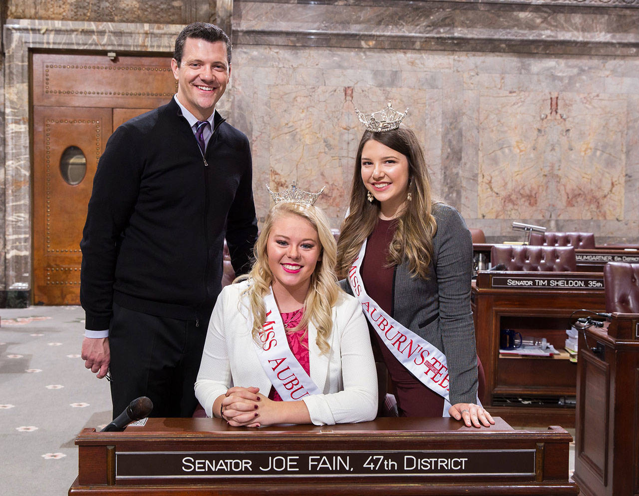 Miss Auburn Heather Haggin, middle, and Miss Auburn&rsquo;s Outstanding Teen Elizabeth Enz join Sen. Joe Fain in Olympia. COURTESY PHOTO, Washington State Legislature