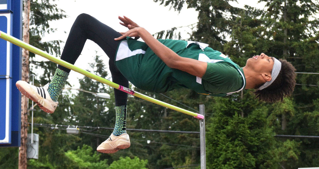 Kentridge’s Tyler Cronk climbs a personal-best 7 feet, 2 inches to capture the 4A West Central District high jump title Thursday at French Field. It is the second-best mark in the country, according to Athletic.net. RACHEL CIAMPI, Kent Reporter