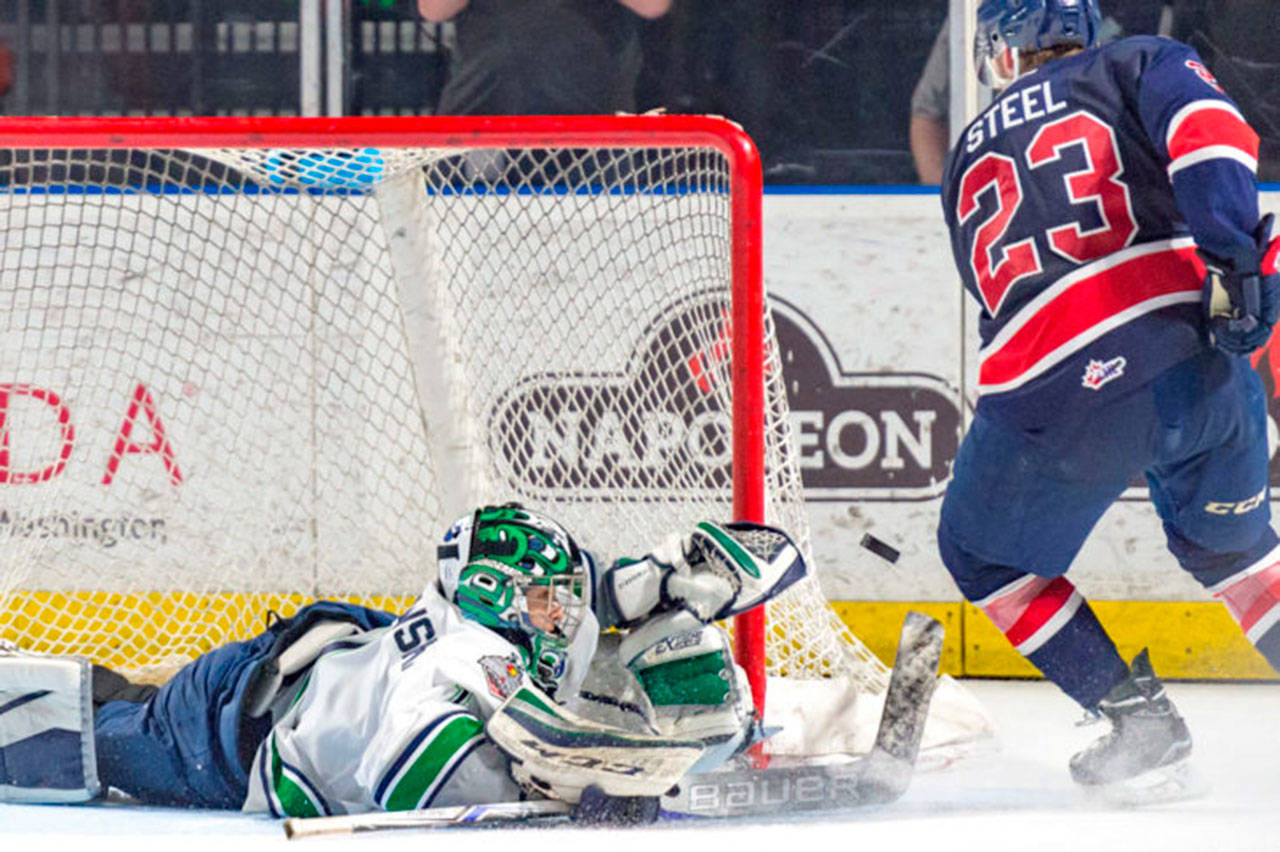 The Thunderbirds’ Carl Stankowski makes a sensational save on a shot by the Pats’ Sam Steel during Game 3 WHL championship series action Tuesday night at the ShoWare Center. COURTESY PHOTO, Brian Liesse/T-Birds