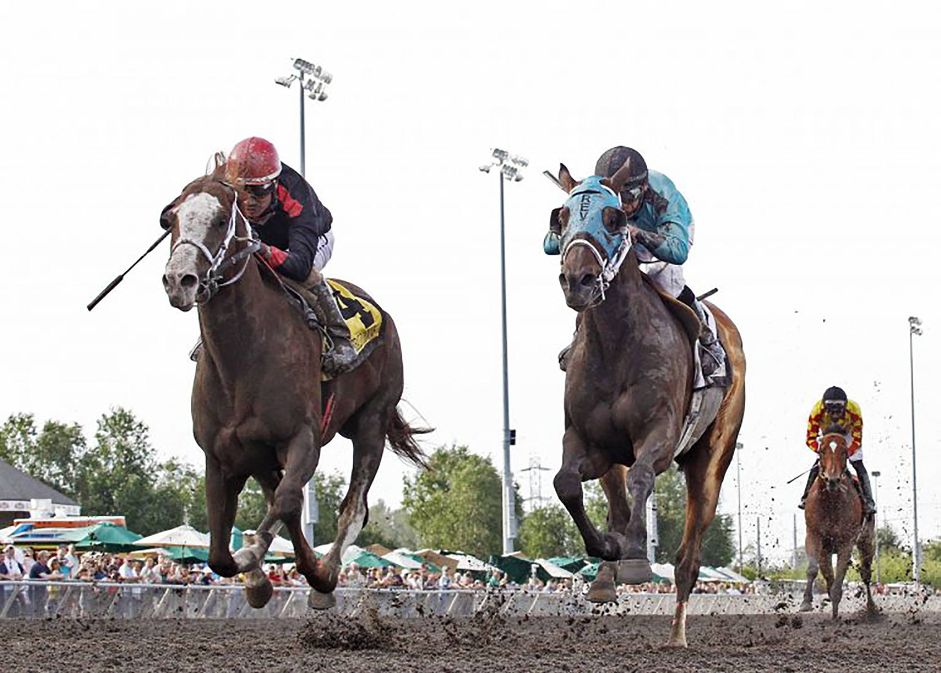 Javier Matias drives Barkley, left, to victory over Mach One Rules, with Isaias Enriquez up, in the $50,000 Governor’s Stakes for 3-year-olds and up at Emerald Downs on Sunday. COURTESY PHOTO, Emerald Downs
