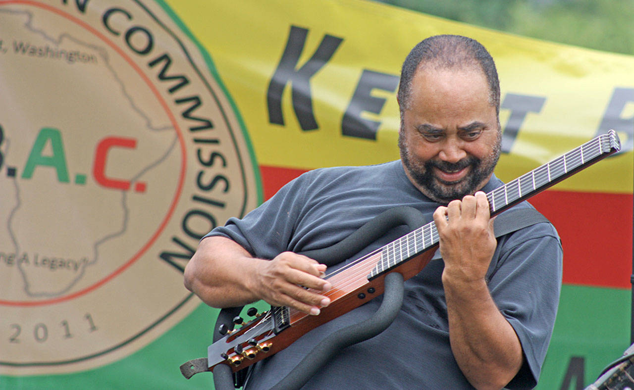 Seattle jazz guitarist Michael Powers performs during the sixth annual Juneteenth festival hosted by Kent Black Action Commission at Morrill Meadows Park last Saturday. MARK KLAAS, Kent Reporter