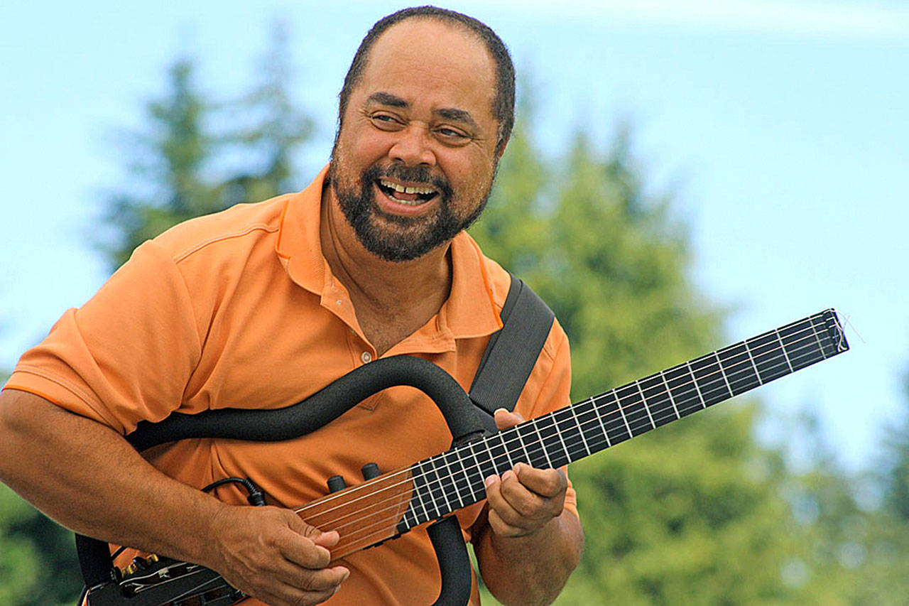 Seattle jazz guitarist Michael Powers performs at the Juneteenth Celebration and Festival at Morrill Meadows Park last year. Powers will return for this year’s event. MARK KLAAS, Kent Reporter