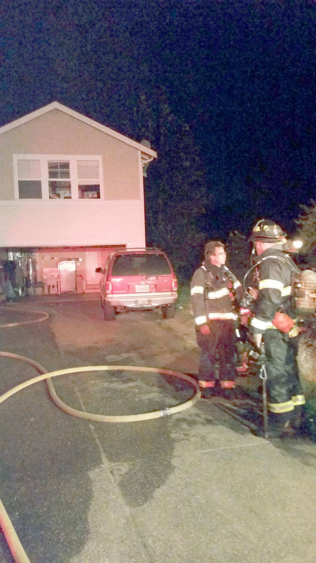 Kent firefighters respond to a fire early Monday morning in the 24600 block of 101st Place.