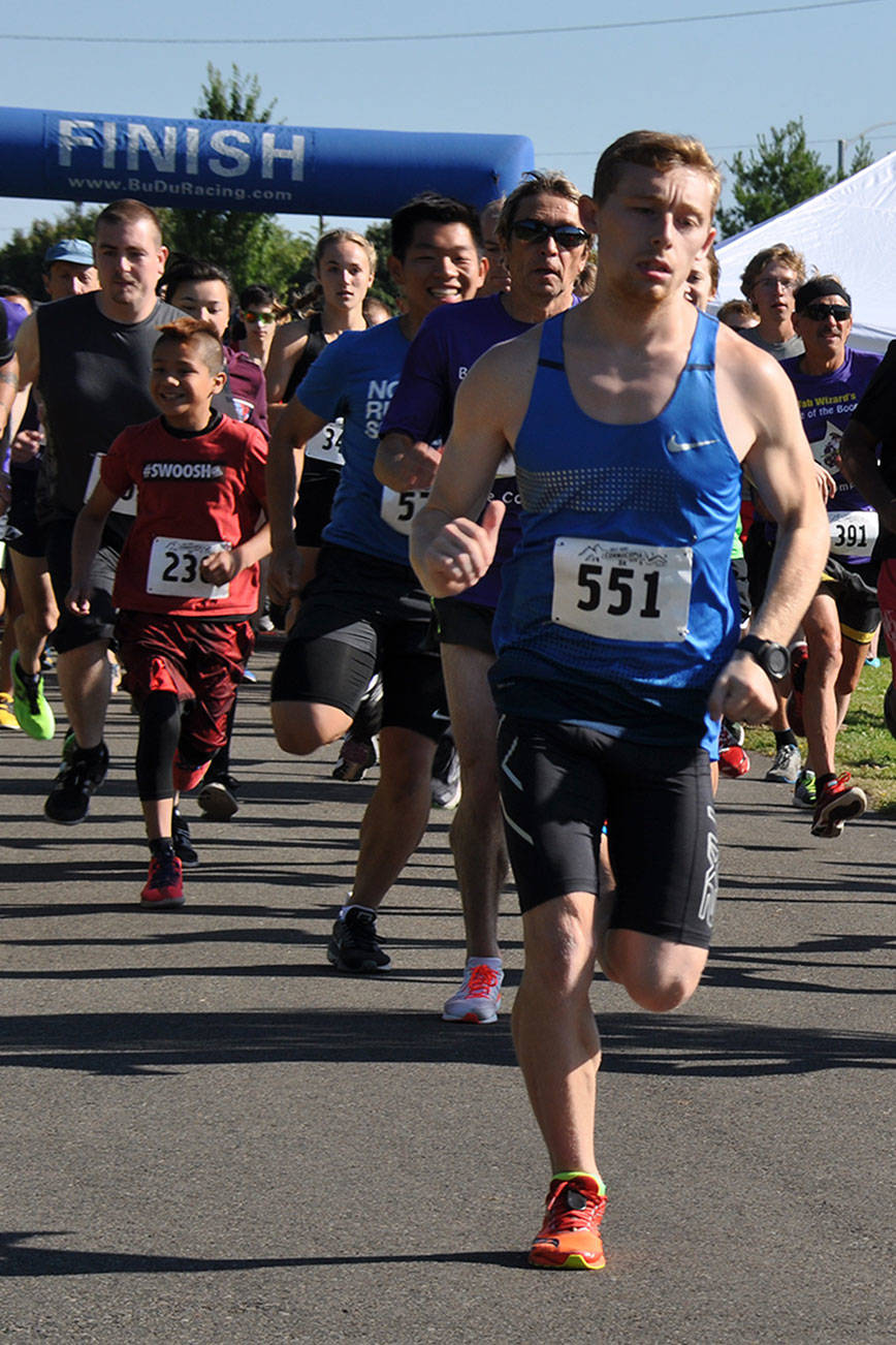 Auburn’s Flannery scoots to victory in festival 5K race | PHOTOS