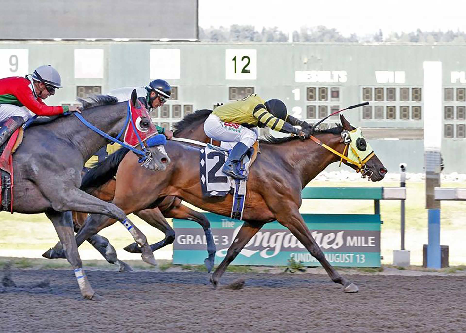Little Dancer, with Rocco Bowen in the reins, right, upset the filed in the $75,000 Washington Oaks for 3-year-old fillies Sunday at Emerald Downs. COURTESY TRACK PHOTO