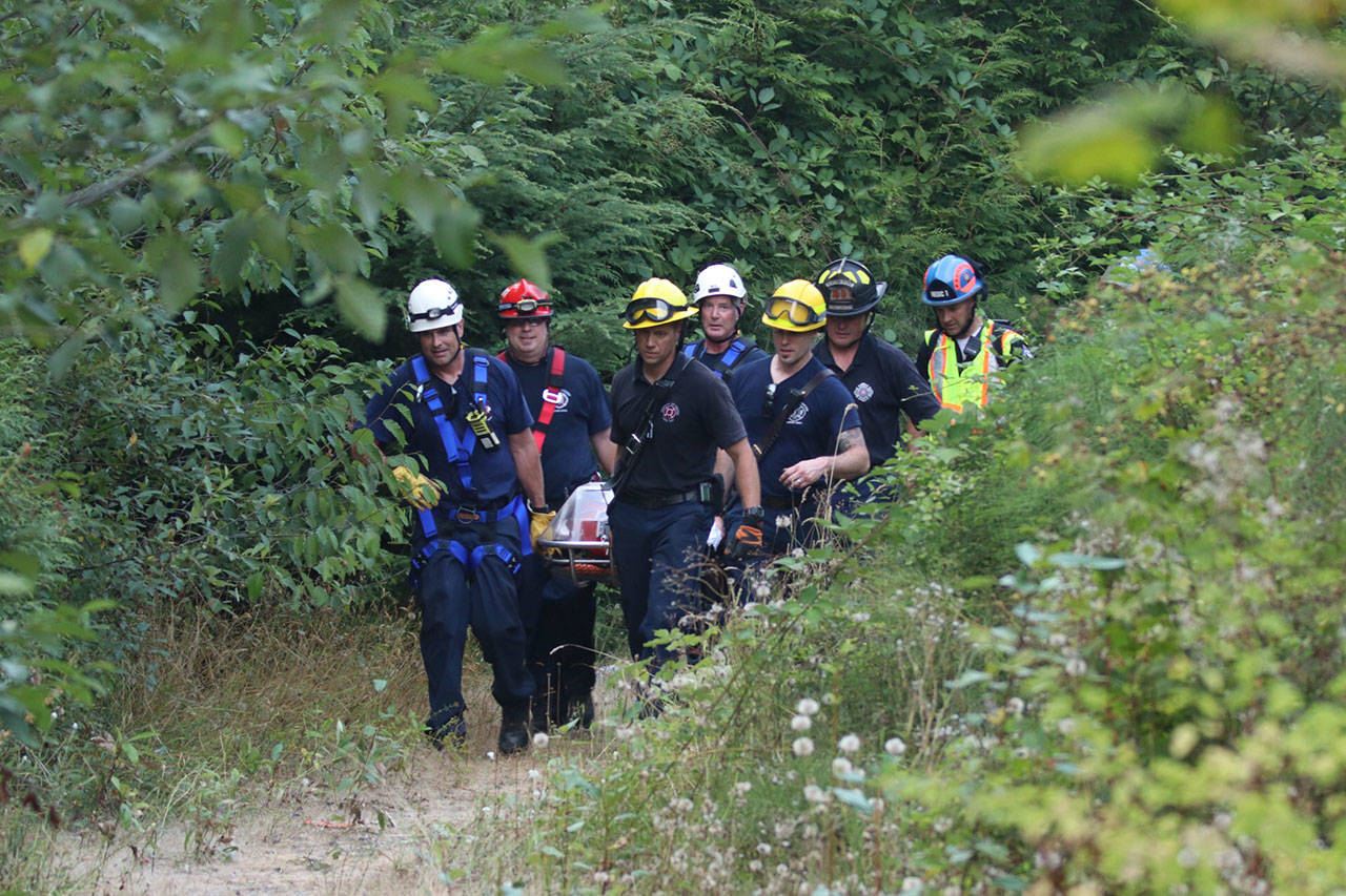 Regional rope rescue teams transport a woman who fell approximately 60 feet from a trail above the Green River on Thursday afternoon. The woman suffered only minor injuries. COURTESY PHOTO, Puget Sound Regional Fire Authority