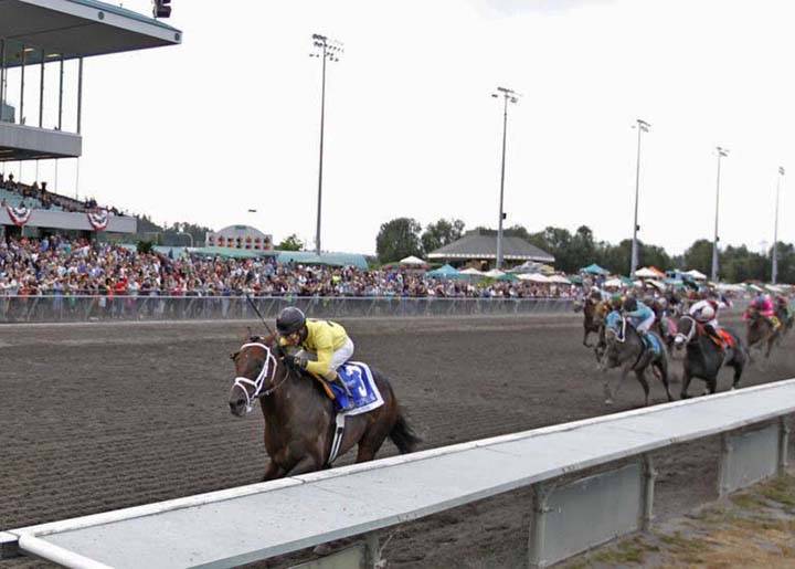 Gold Rush Dancer, with 9-year-old Evin Roman up, darts to a dominant 4¾-length victory Sunday in the 82nd running of the $200,000 Longacres Mile (Grade 3) at Emerald Downs. COURTESY TRACK PHOTO