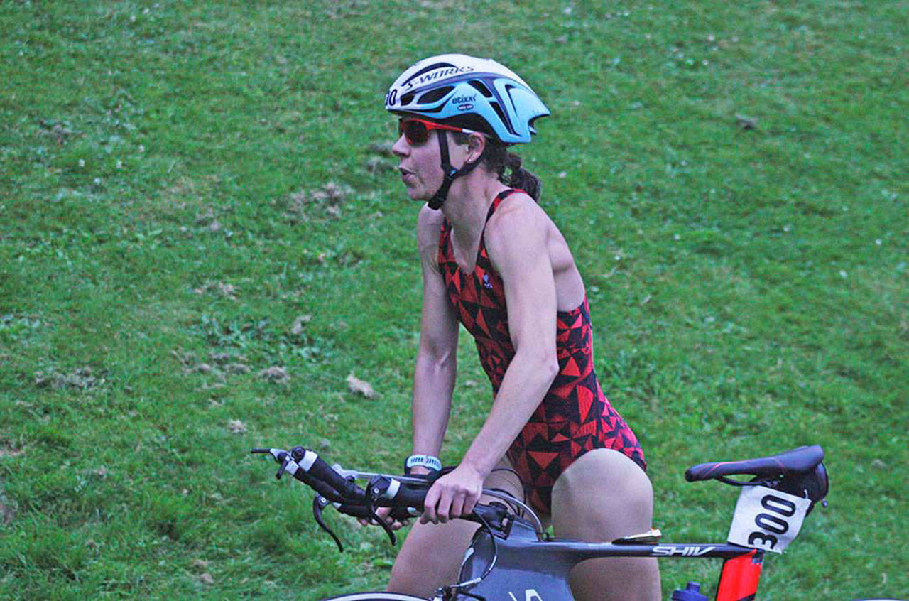 Kelsey Morfitt, who took third in the sprint wave women’s division, prepares for her spin on the bike. MARK KLAAS, Kent Reporter