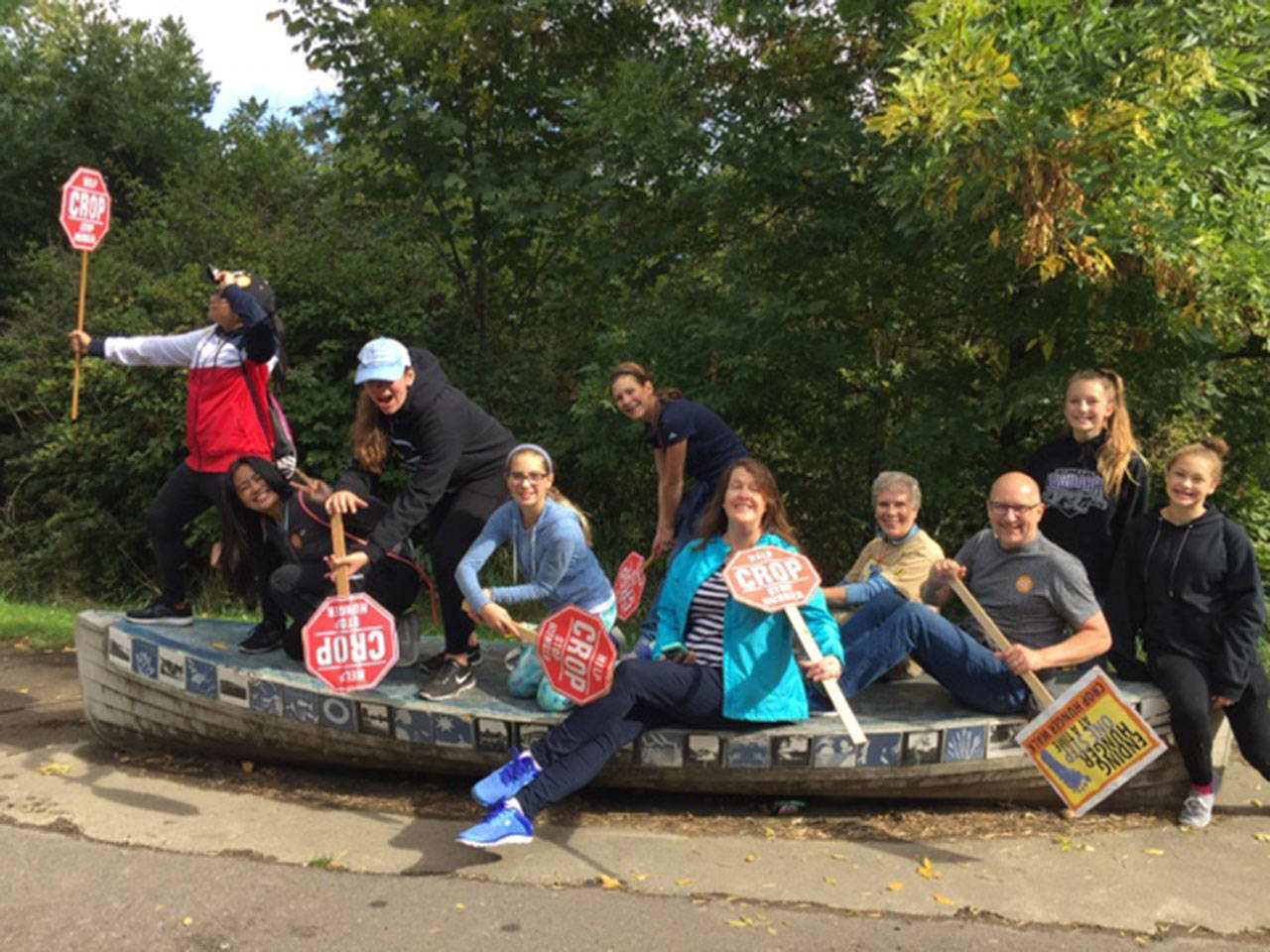 A group participating in the 25th annual Dr. Dave Turner Memorial Kent CROP Hunger Walk stops by to occupy a canoe along the Green River Trail. COURTESY PHOTO
