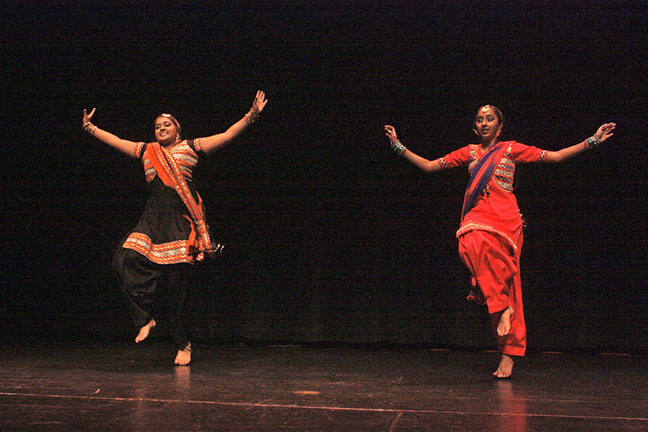 Navreet, left, and Prabhreet Mahal, perform the dance Punjabi Bhangra during the teen division finals. MARK KLAAS, Kent Reporter