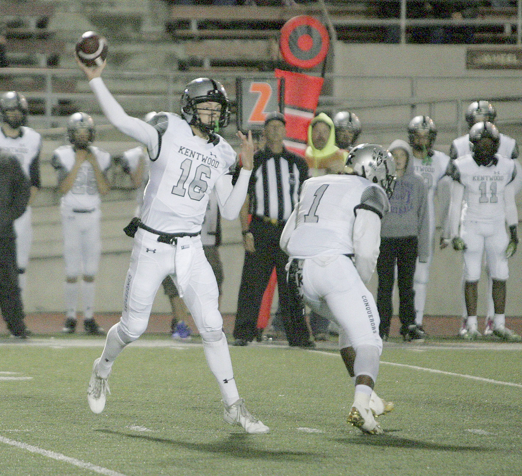 Kentwood quarterback Justin Seiber prepares to deliver a pass against Kentridge last Friday night at French Field. Dennis Box, Reporter
