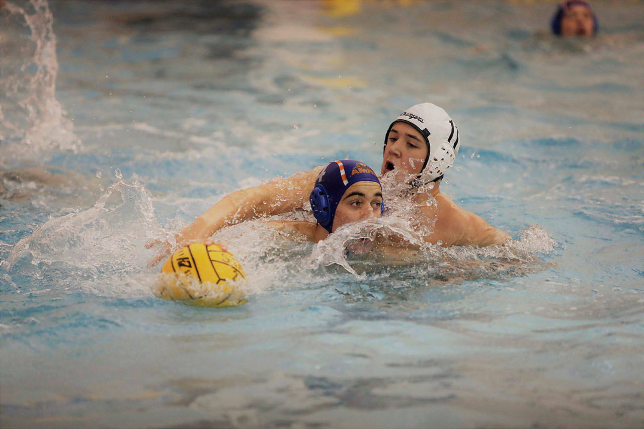 Kentridge junior Adrian Tirtu, right, defends Auburn Mountainview senior and captain Truman Sulewski during district playoff action. COURTESY PHOTO, Tracy Arnold