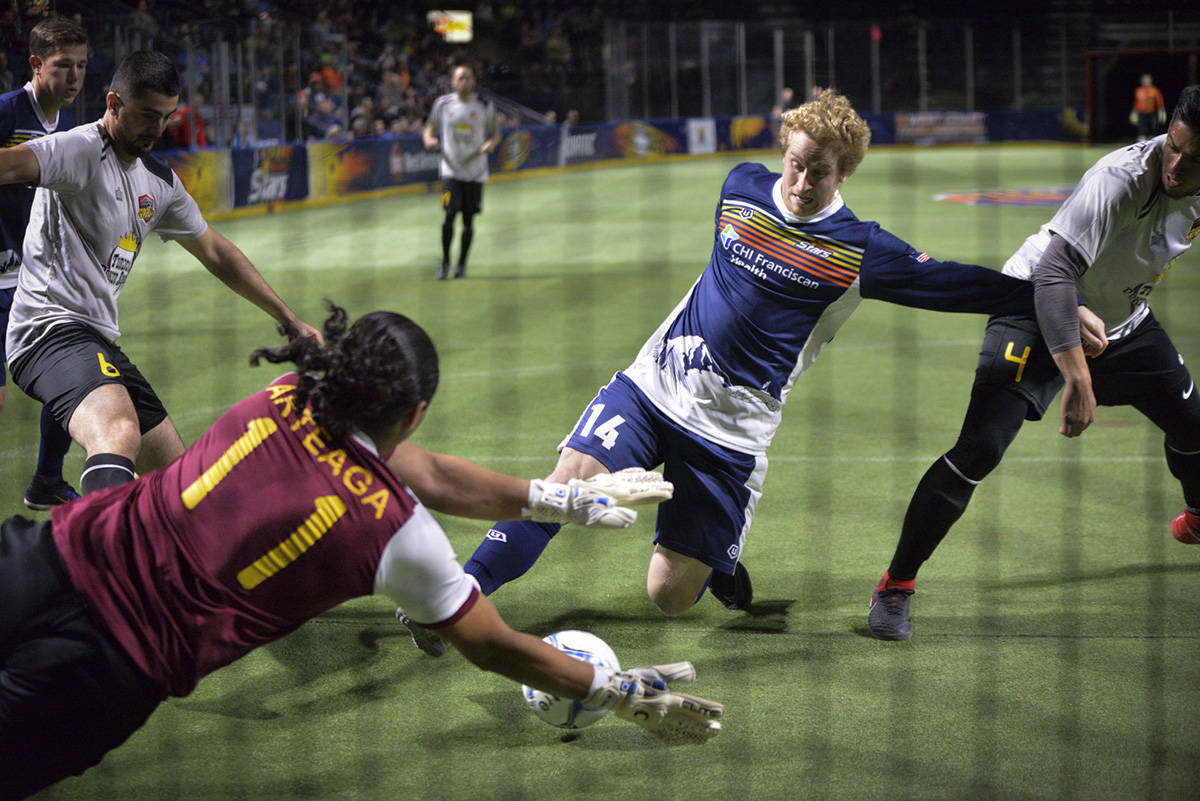 The Stars’ Vince McCluskey scores one of this three goals against the Express in MASL play at the accesso ShoWare Center on Friday night. COURTESY PHOTO, Stars