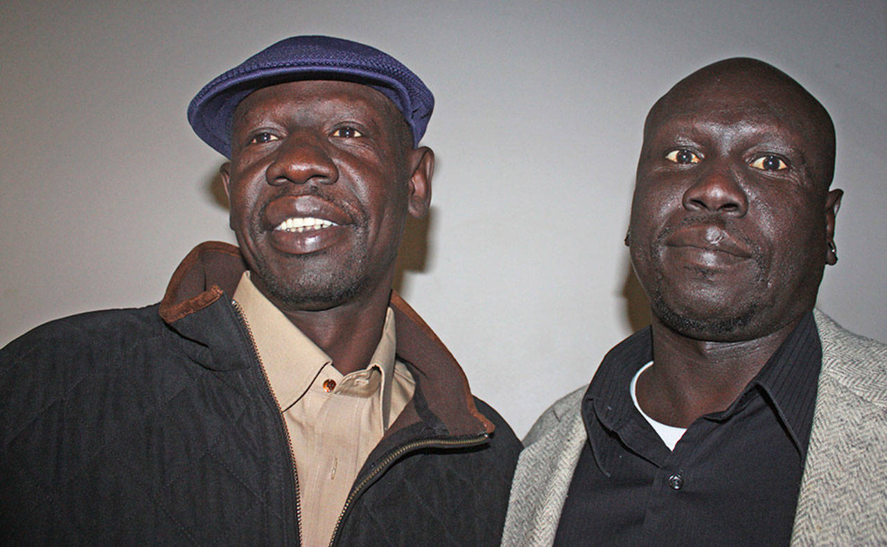 Ring, left, and Athian Bol have overcome so much in their lives to find a new start in the Kent community. MARK KLAAS, Kent Reporter