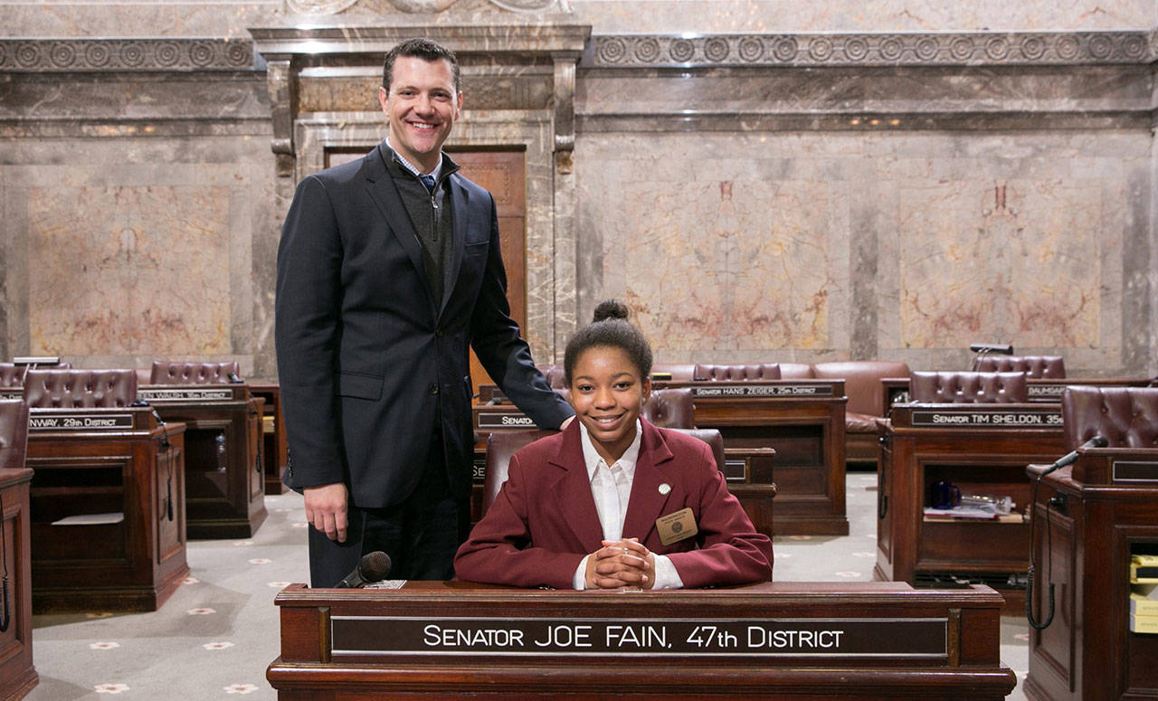 Sen. Joe Fain, with Chinyere Naome Brent, a student from Kent’s Technology Access Foundation Academy, during the last legislative session at the Capitol in Olympia. COURTESY PHOTO