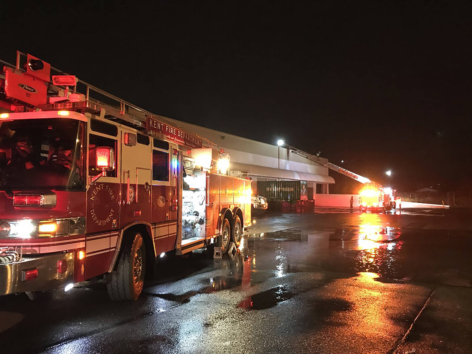 Local firefighters put out a commercial building fire in the 20100 block of 72 Ave.S., Kent, Friday night. COURTESY PHOTO, Puget Sound Regional Fire Authority