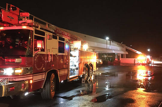 Crews douse empty commercial building fire