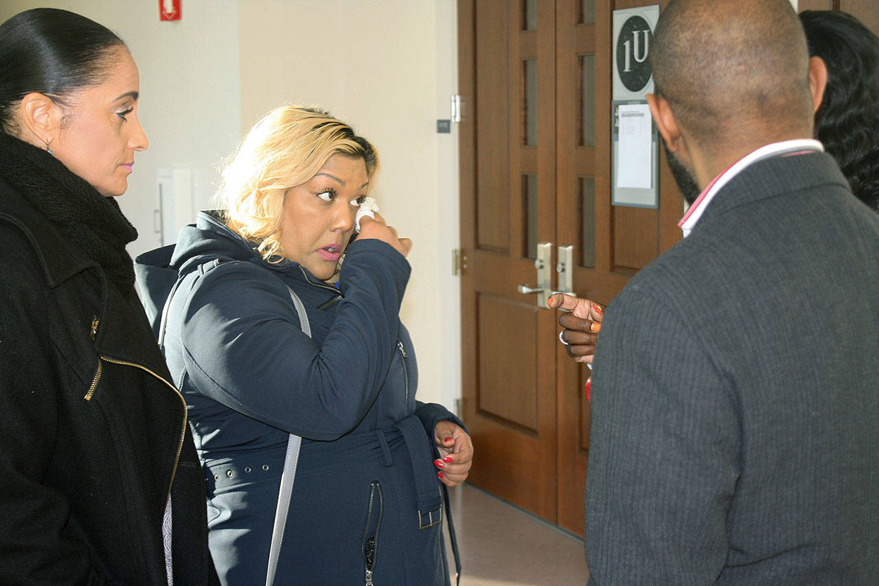 Sonia Joseph wipes away a tear on Monday prior to entering the inquest hearing at the Maleng Regional Justice Center in Kent into the June shooting of her son Giovonn Joseph-McDade by a Kent Police officer. STEVE HUNTER, Kent Reporter