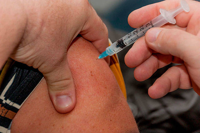 Flu cases spike in state, peak season still several weeks out