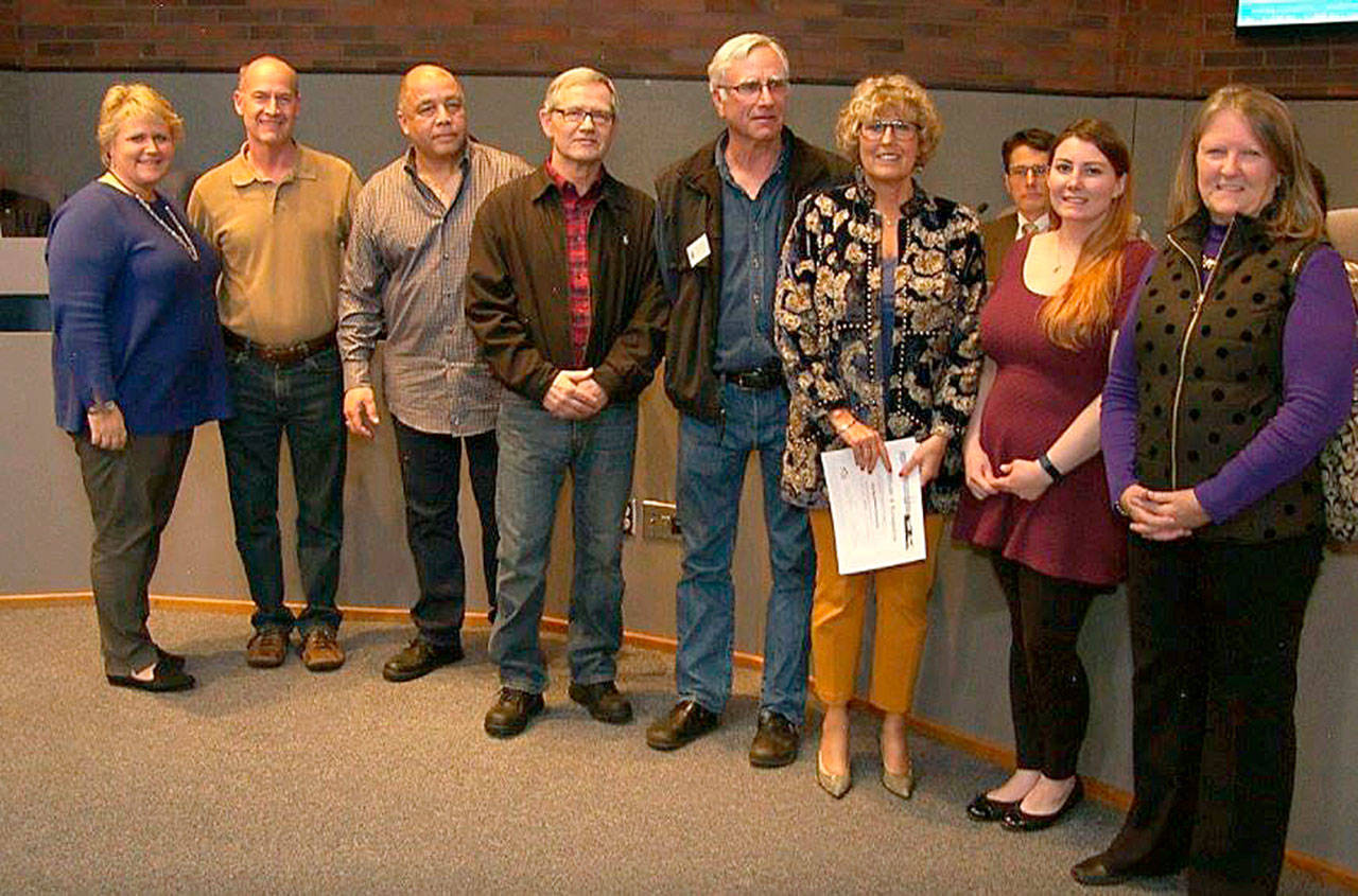 Kent Mayor Dana Ralph, far left, joins Barbara Smith, Kent Downtown Partnership executive director, sixth from the left, and other KDP members at a recent City Council meeting. The KDP was designated as a recognized Neighborhood Council. COURTESY PHOTO, KDP