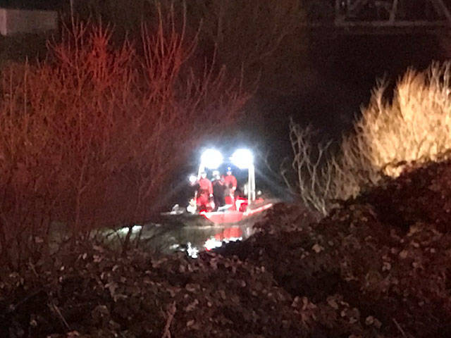 A Puget Sound Regional Fire Authority rescue boat searches the Green River after a vehicle was driven into it early Wednesday morning. COURTESY PHOTO, Puget Sound RFA