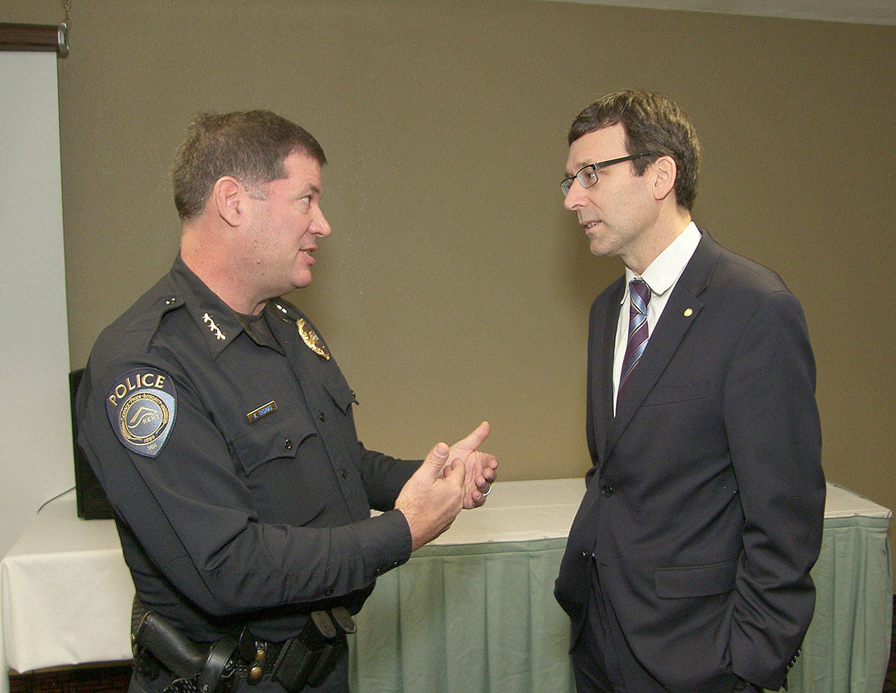 State Attorney General Bob Ferguson, right, chats with Kent Police Chief Ken Thomas during his visit to Kent on Tuesday. COURTESY PHOTO, Don Dinsmore