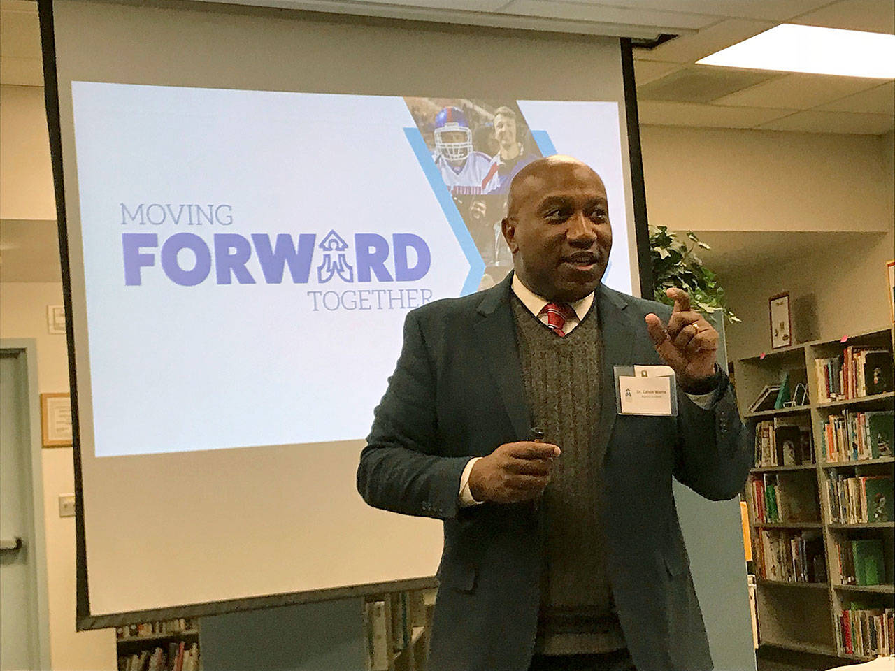 Kent School District Superintendent Calvin Watts explains the current operating budget during a community forum at Meridian Middle School on Jan. 25. Watts spelled out the importance of the two school levies on the Feb. 13 special election ballot. MARK KLAAS, Kent Reporter