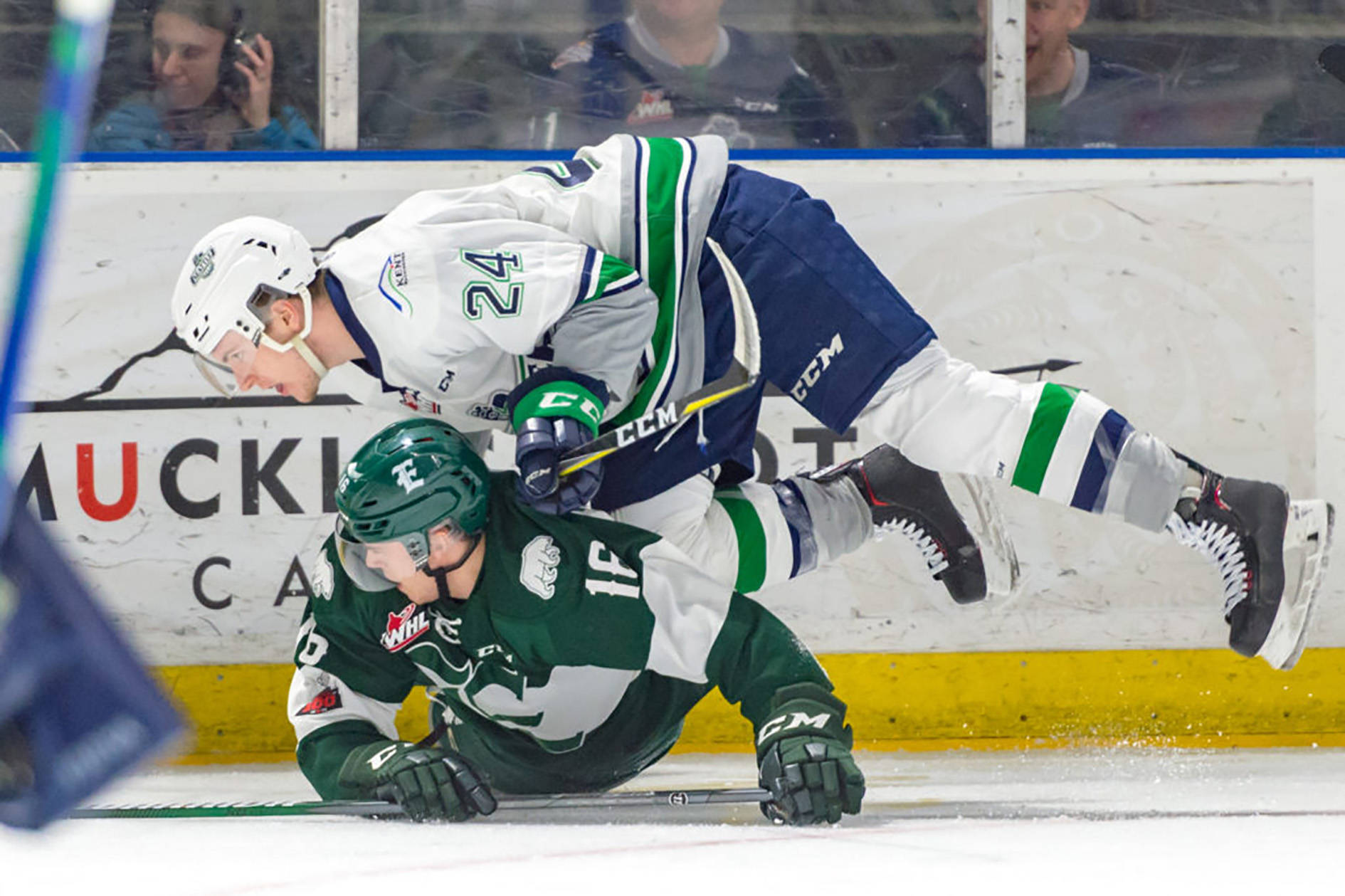 The Thunderbirds’ Jake Lee collides with the Silvertips’ Luke Ormsby along the boards during WHL play Friday night. COURTESY PHOTO, Brian Liesse, T-Birds