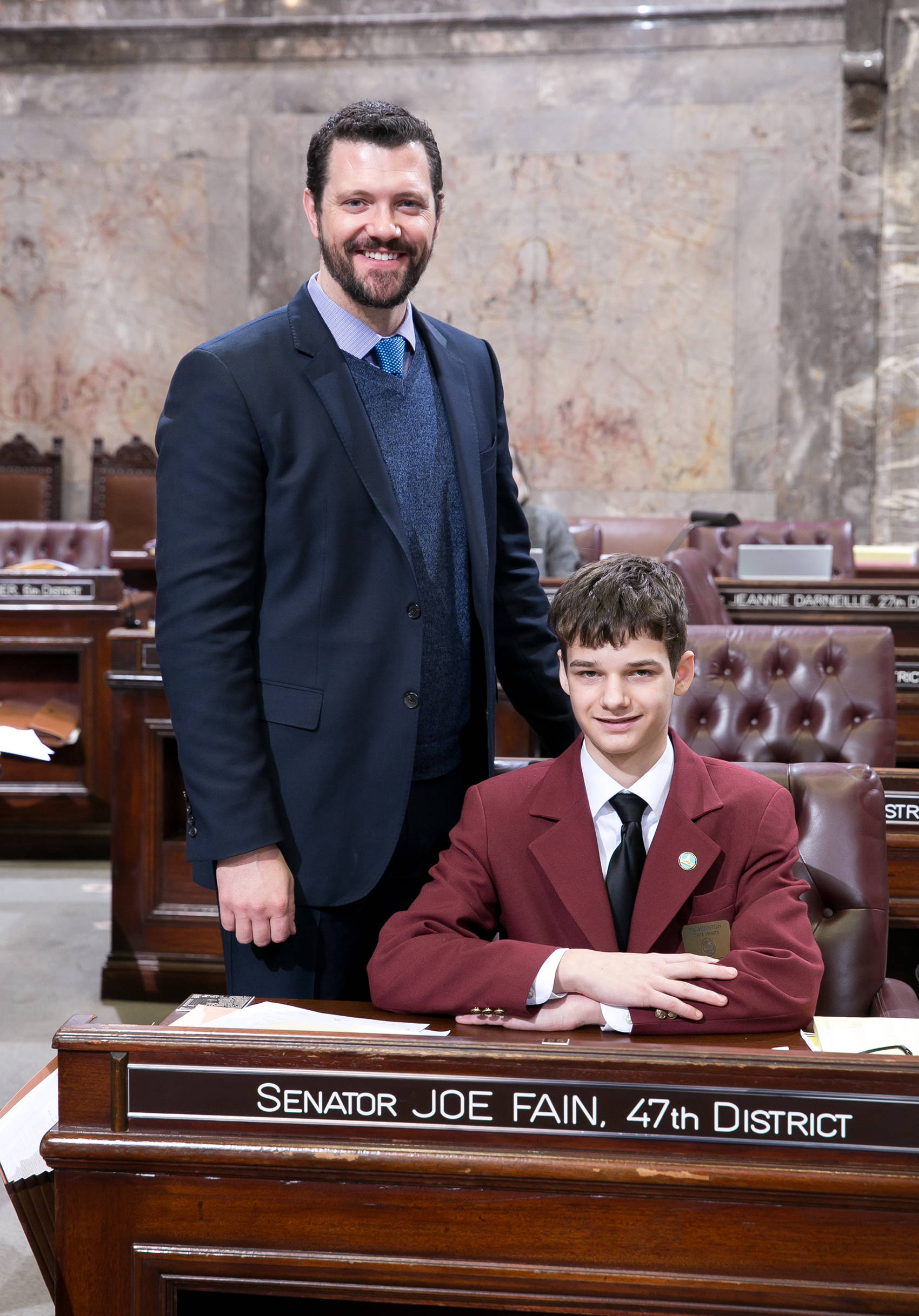 Logan Gust on the Senate floor with his sponsor, Sen. Joe Fain, R-Auburn. COURTESY PHOTO, Washington State Legislature