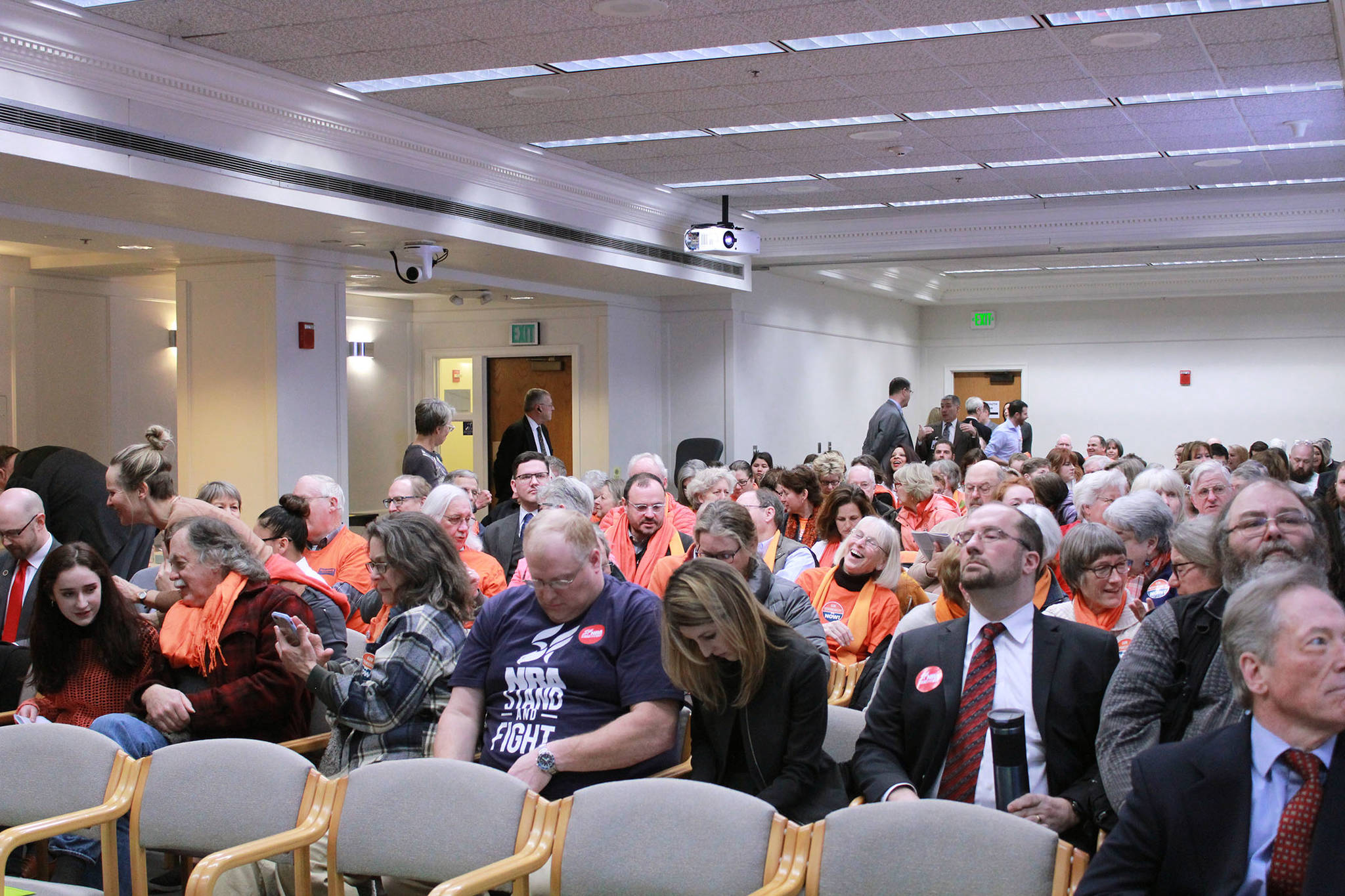The Alliance for Gun Responsibility, wearing orange, and gun rights activists packed the Senate Ways and Means hearing room. Photo by Taylor McAvoy