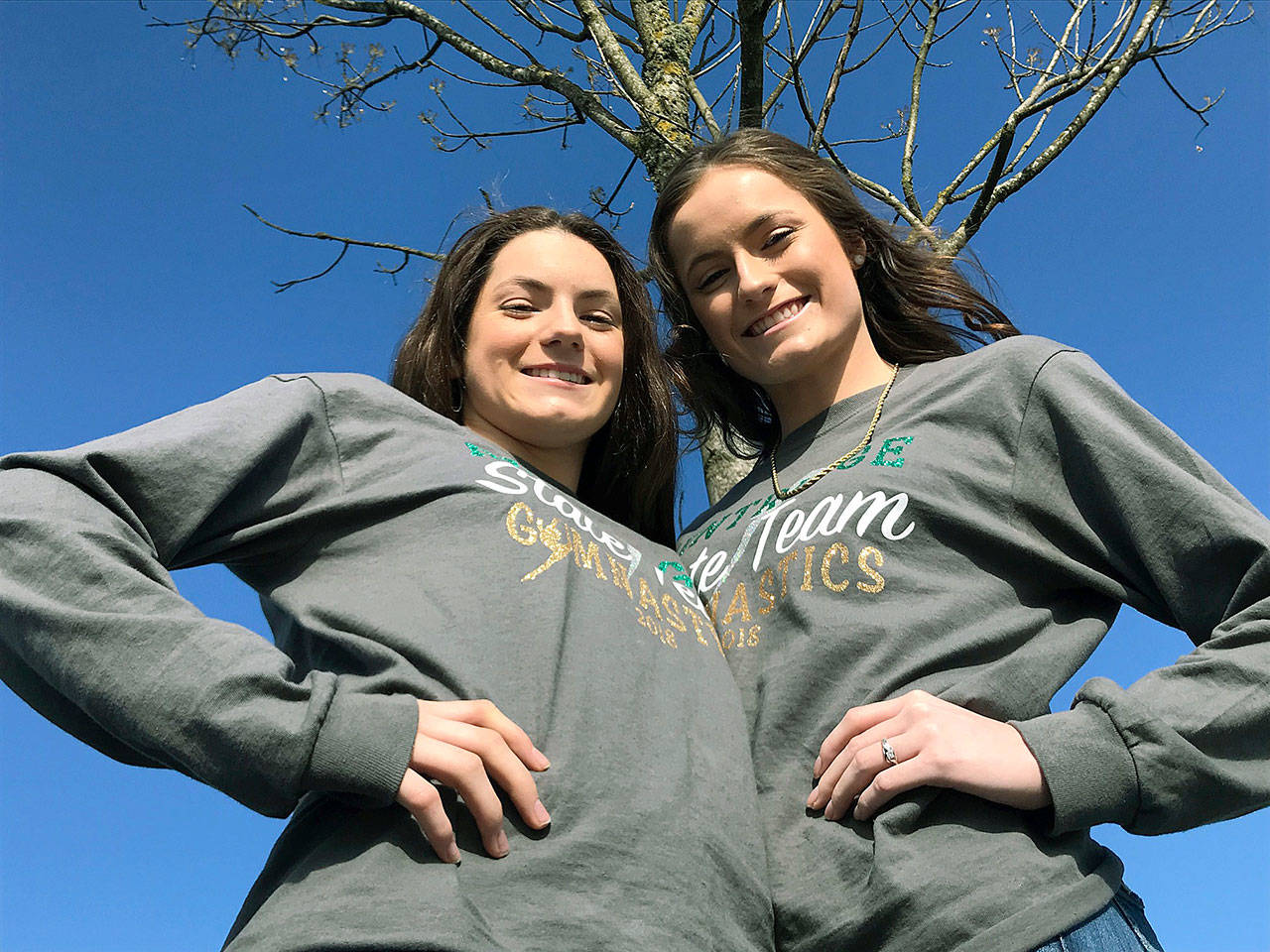 Lizzy, left, and Lexi McKnight helped show the way for Kentridge’s breakout season in gymnastics. Lexi took the 4A all-around title and Lizzy finished 12th as the Chargers competed as a team in the state finals for the first time in program history. MARK KLAAS, Kent Reporter