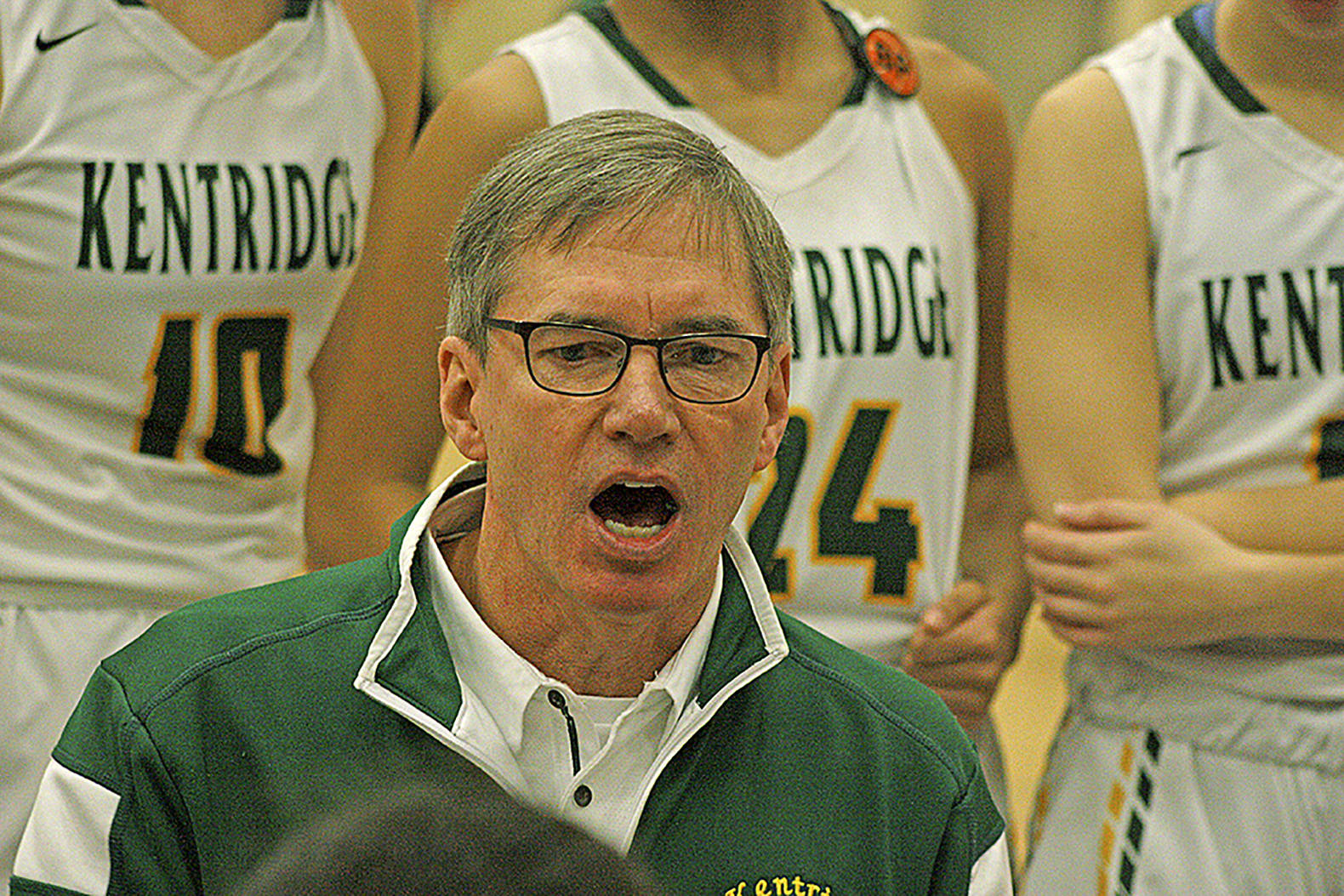 Kentridge coach Bob Sandall delivers instructions to his team during a timeout. MARK KLAAS, Kent Reporter
