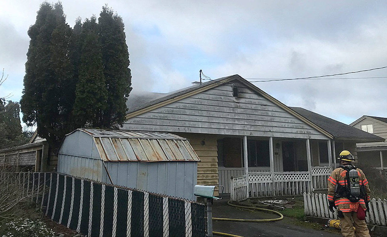 Firefighters put out a fire at an abandoned house Friday in the 2900 block of South 253rd Street on Kents West Hill. COURTESY PHOTO, Puget Sound Fire