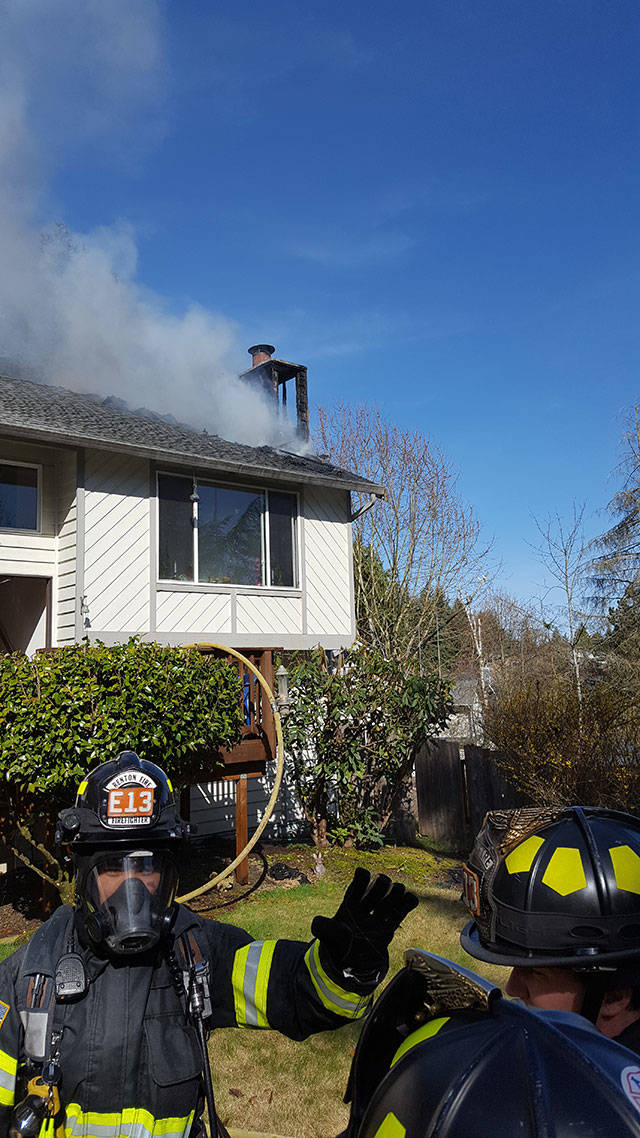 Firefighters put out a house fire that started in the chimney box and extended into the attic on Kent’s East Hill late Monday morning. COURTESY PHOTO, Puget Sound RFA