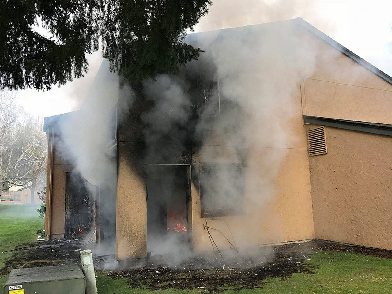 Firefighters put out a fire Thursday morning at a Kent apartment complex fire in the 10600 block of Southeast 264th Street. COURTESY PHOTO, Puget Sound Fire