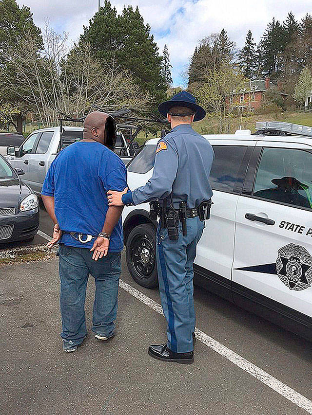 Dominic L. Dixon, of Kent, was arrested in the March 22 hit-and-run accident in Kitsap County that killed Belfair resident Katie Phillips. She died while assisting a stranded motorist whose vehicle had run out of gas near the Southworth ferry dock. Dixon was identified and arrested on April 2 by Washington State Patrol detectives. His face was obscured in this WSP photo. COURTESY PHOTO, State Patrol